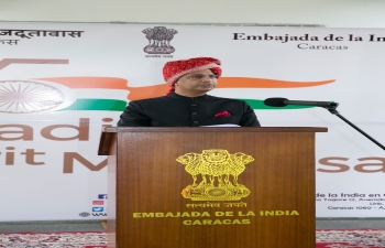 Ambassador Abhishek Singh reading excerpts from the address of Hon'ble Rashtrapati ji delivered on the eve of the 75th Independence Day of India